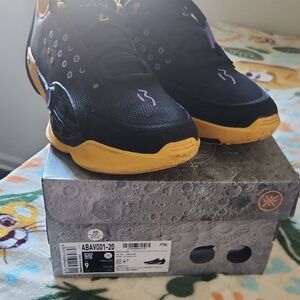 Black & Yellow Basketball Sneakers with Purple Accents. Way Of Wade All City 13